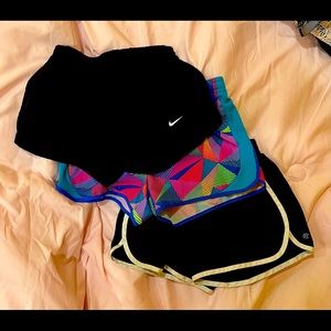 Three pairs of girls athletic shorts, built in underwear